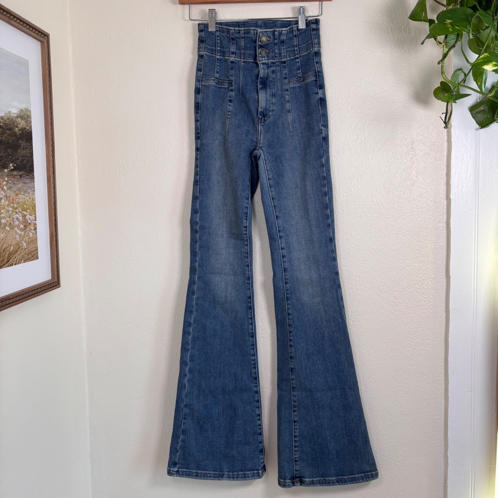 Free people we the free Jayde high rise flare jeans size 25 medium wash